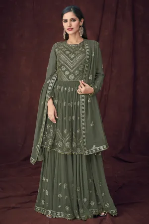 Fancy Fabric Green Peplum Style Designer Lehenga Suit